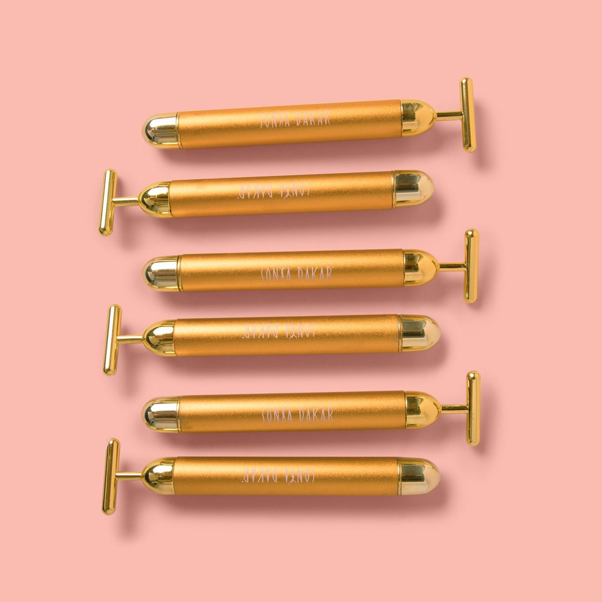 Omega Energizing Wand cooling metal tip glides along jawline to sculpt and lift