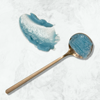 Blue Butterfly Balm rich buttery texture melting into dry and irritated skin