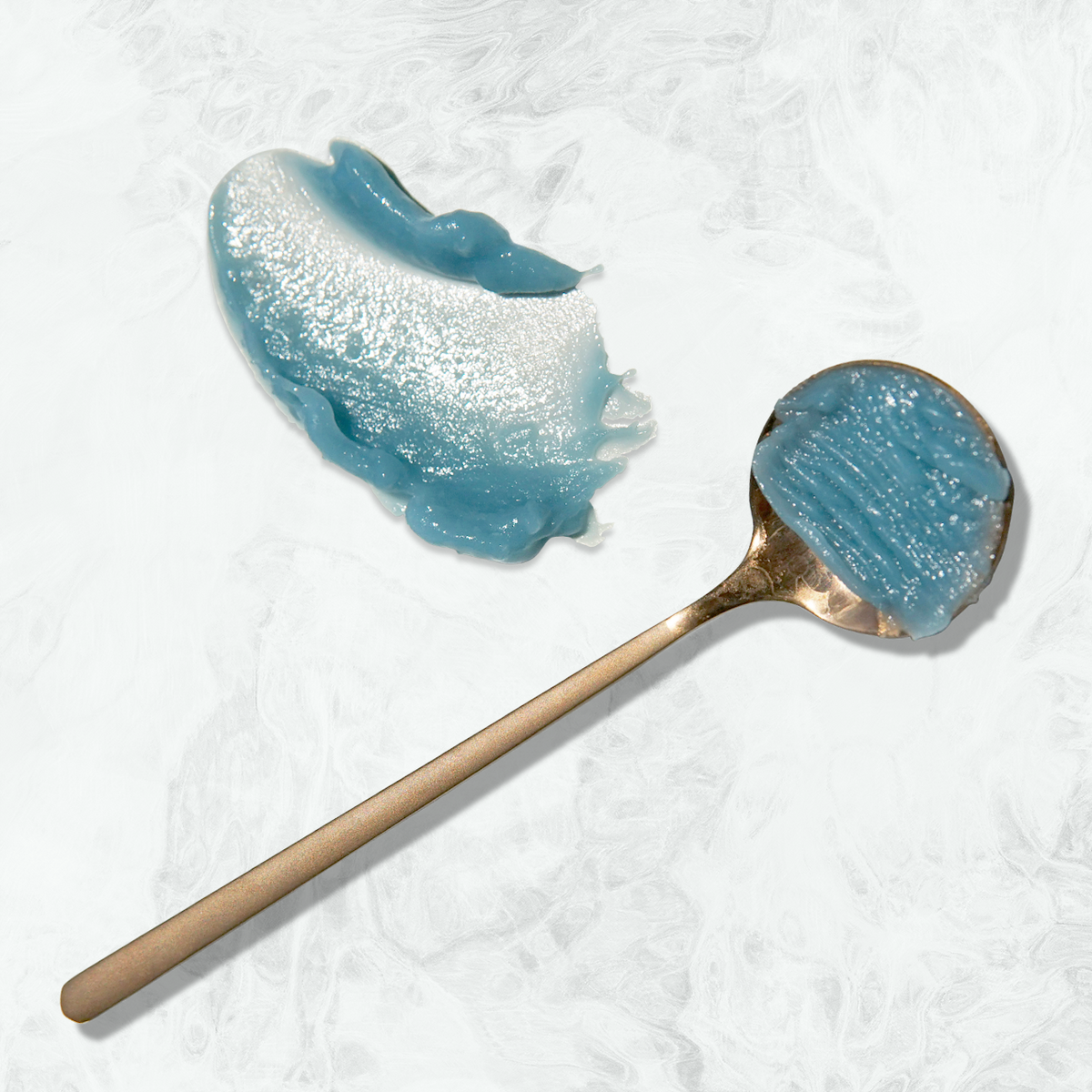 Blue Butterfly Balm rich buttery texture melting into dry and irritated skin