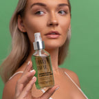 Sonya Dakar Green Energy facial toner in use – mist sprayed on cleansed face