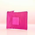 Sonya Dakar Limited Edition makeup pouch – embossed logo on vegan leather nylon bag