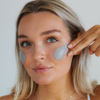 Model applying Sonya Dakar Volcano Mask clarifying clay treatment