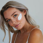 Sonya Dakar Nano Mask in use – model applies creamy hydrating mask to face